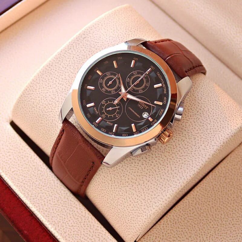 TISSOT TCLASSIC CHRONOGRAPH WATCH A WHITE DIAL ROSE GOLDTONE AND A BROWN LEATHER STRAP