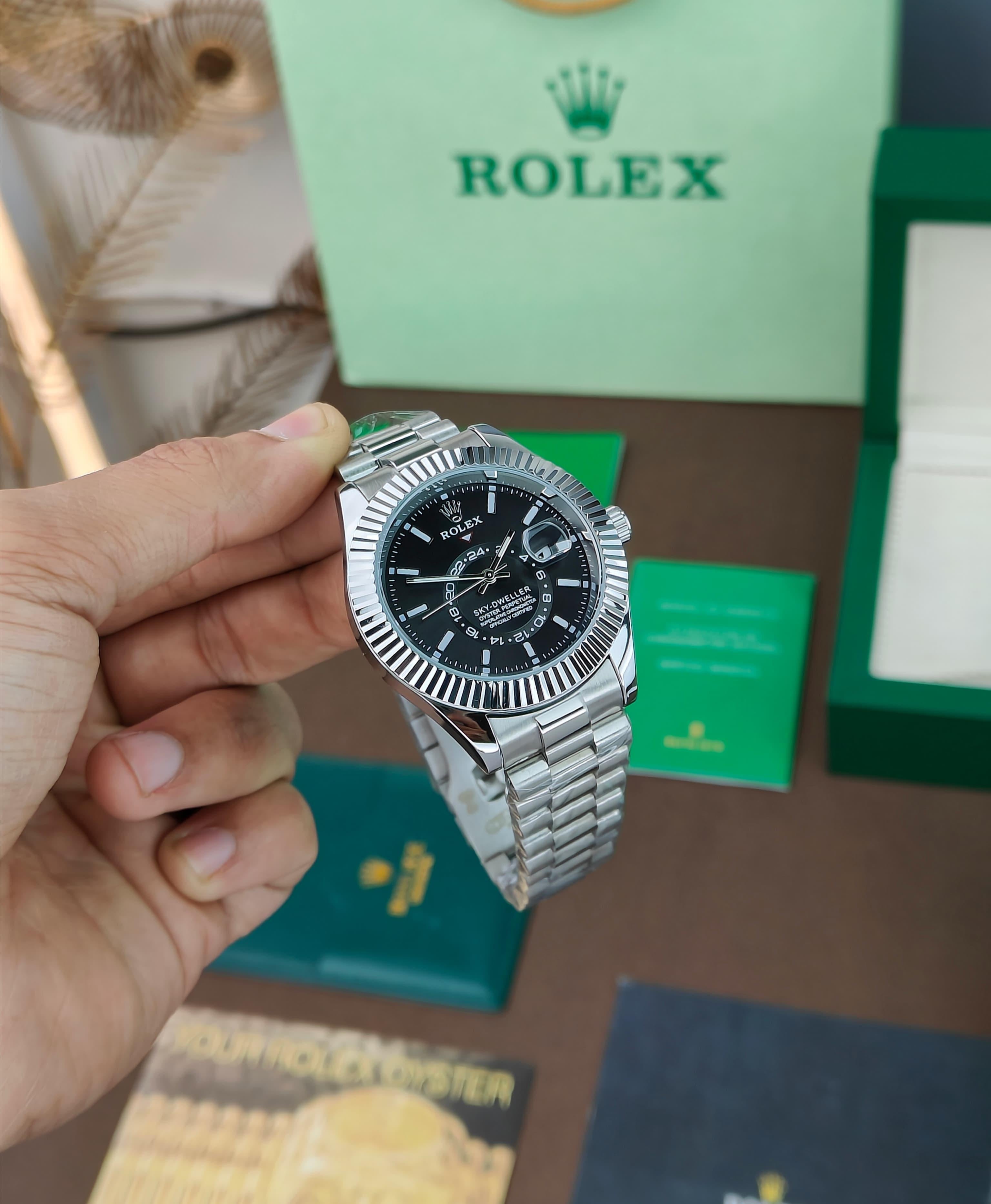 ROLEX SKY-DWELLER OYSTER CASE AN ANNUAL CALENDAR AND DUAL TIME ZONE DISPLAY