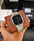 RADO TRUE SQUARE WATCH WITH A POLISHED SILVER-TONE CASE AND A BLACK DIAL