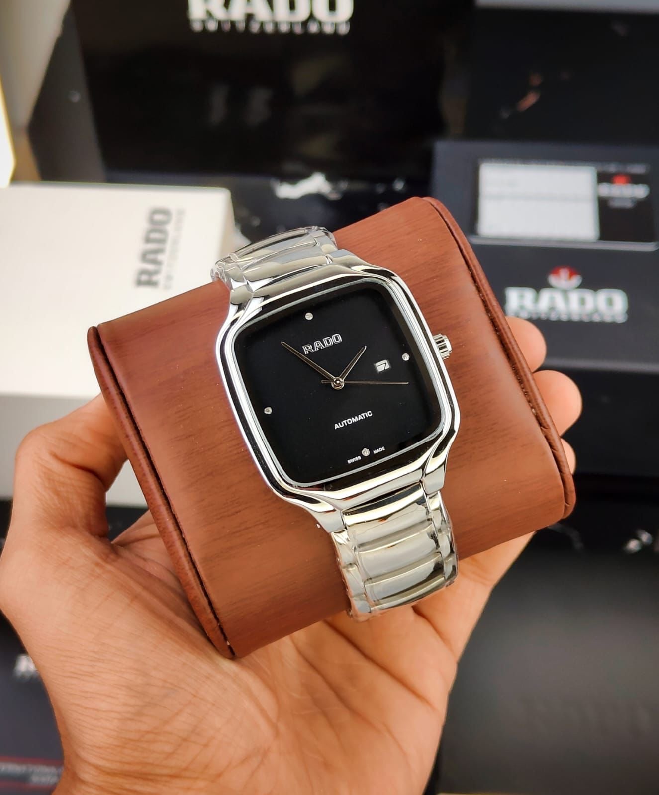 RADO TRUE SQUARE WATCH WITH A POLISHED SILVER-TONE CASE AND A BLACK DIAL