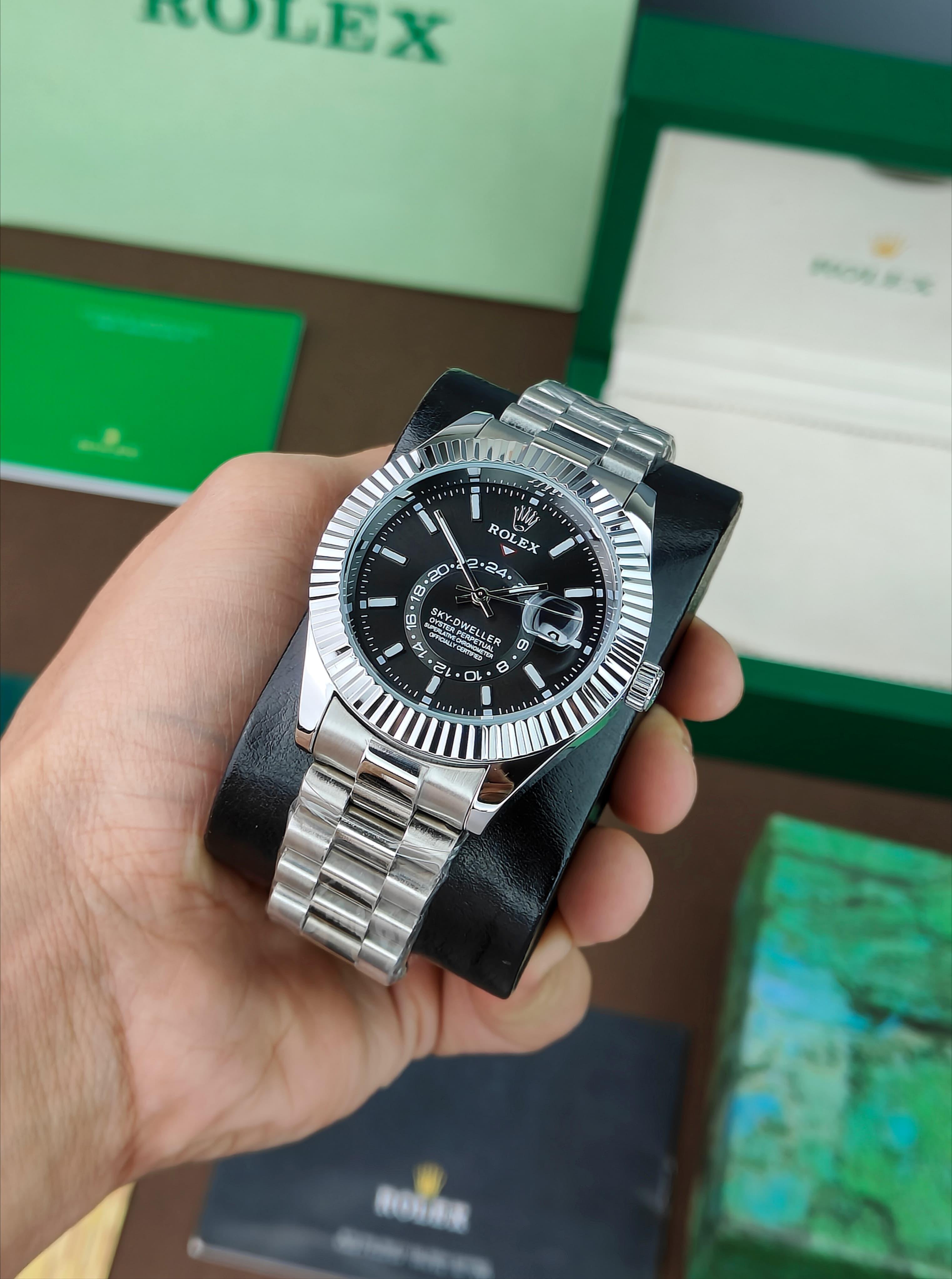ROLEX SKY-DWELLER OYSTER CASE AN ANNUAL CALENDAR AND DUAL TIME ZONE DISPLAY