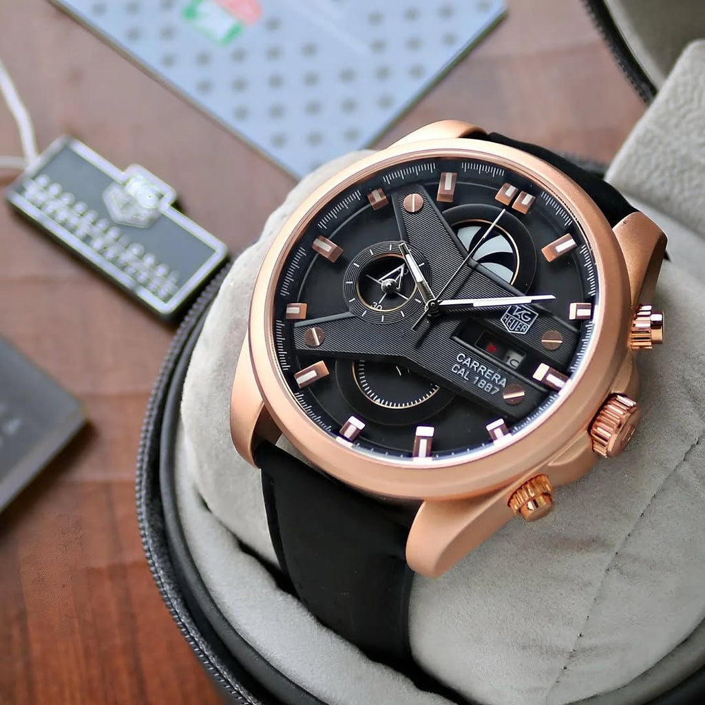 TAG HEUER CARRERA CALIBRE 1887 WATCH A ROSE GOLD-TONE CASH A BLACK DIAL AND BLACK STRAP