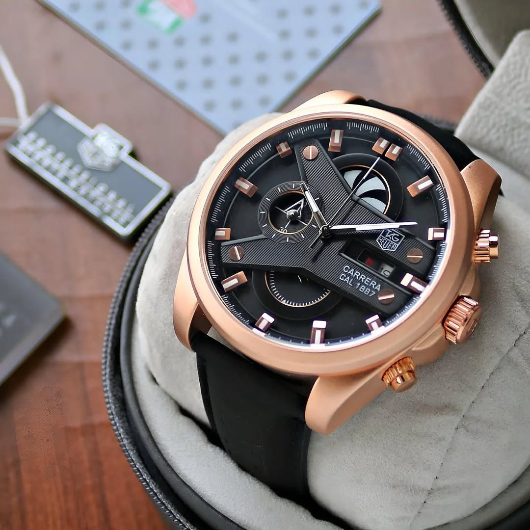 TAG HEUER CARRERA CALIBRE 1887 WATCH A ROSE GOLD-TONE CASH A BLACK DIAL AND BLACK STRAP