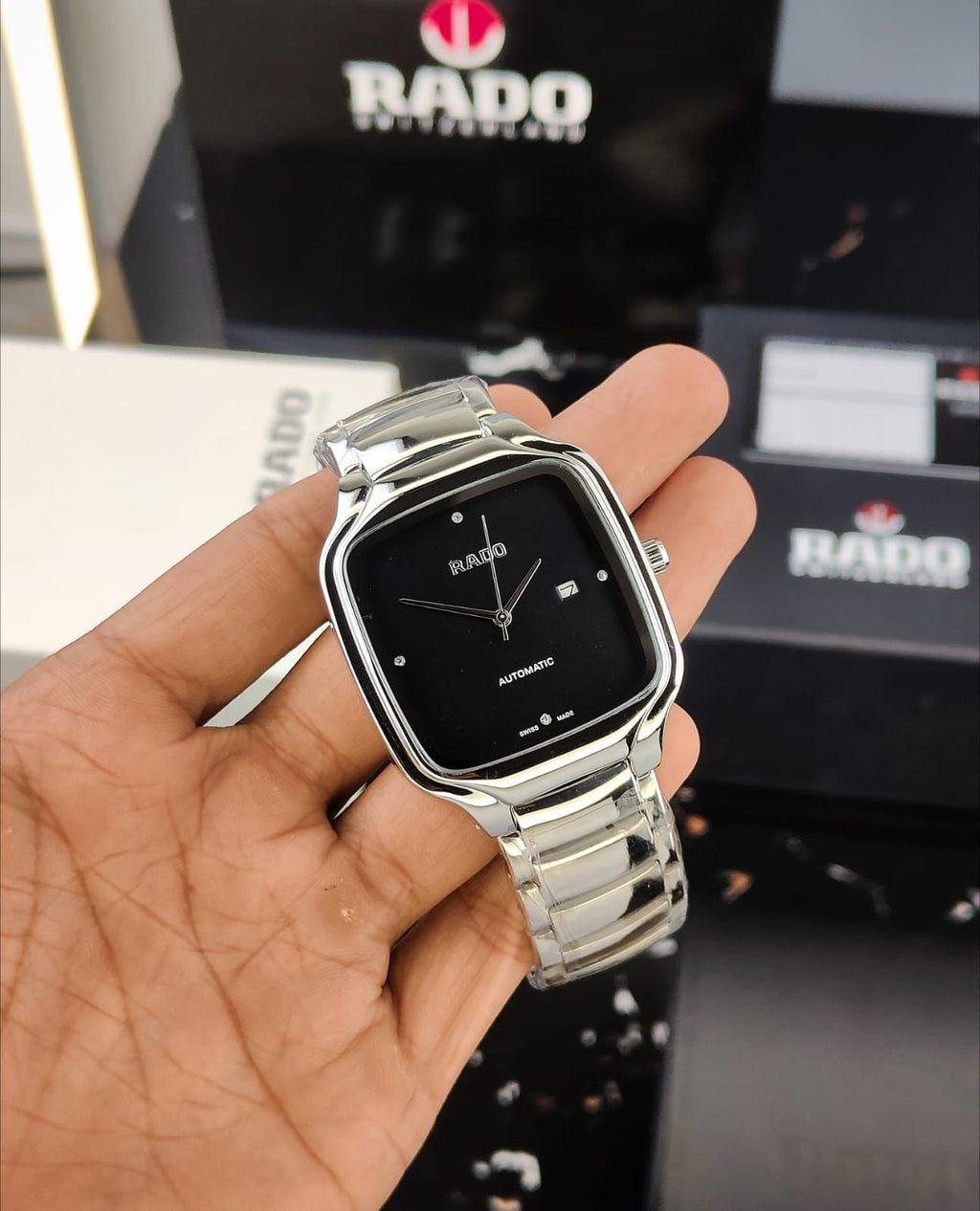 RADO TRUE SQUARE WATCH WITH A POLISHED SILVER-TONE CASE AND A BLACK DIAL