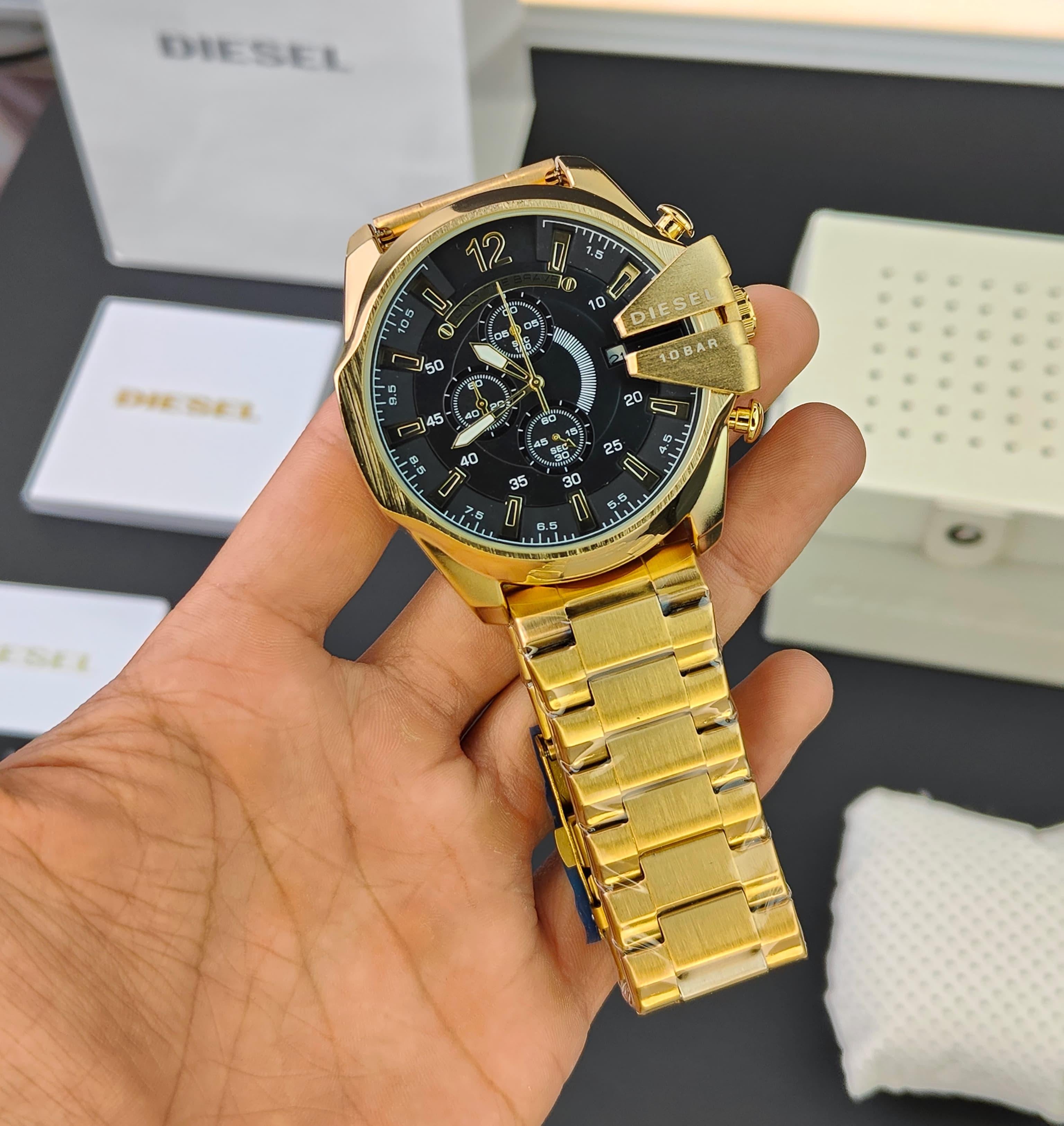 DIESEL 10 BAR MEGA CHIEF CHRONOGRAPH WATCH IN GOLD TONE WITH A BLACK DIAL