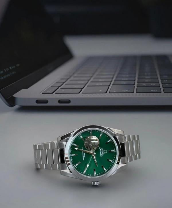 Omega seamaster open heart green dial watch