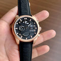 TAG HEUER CARRERA CALIBRE 1887 WATCH A ROSE GOLD-TONE CASH A BLACK DIAL AND BLACK STRAP