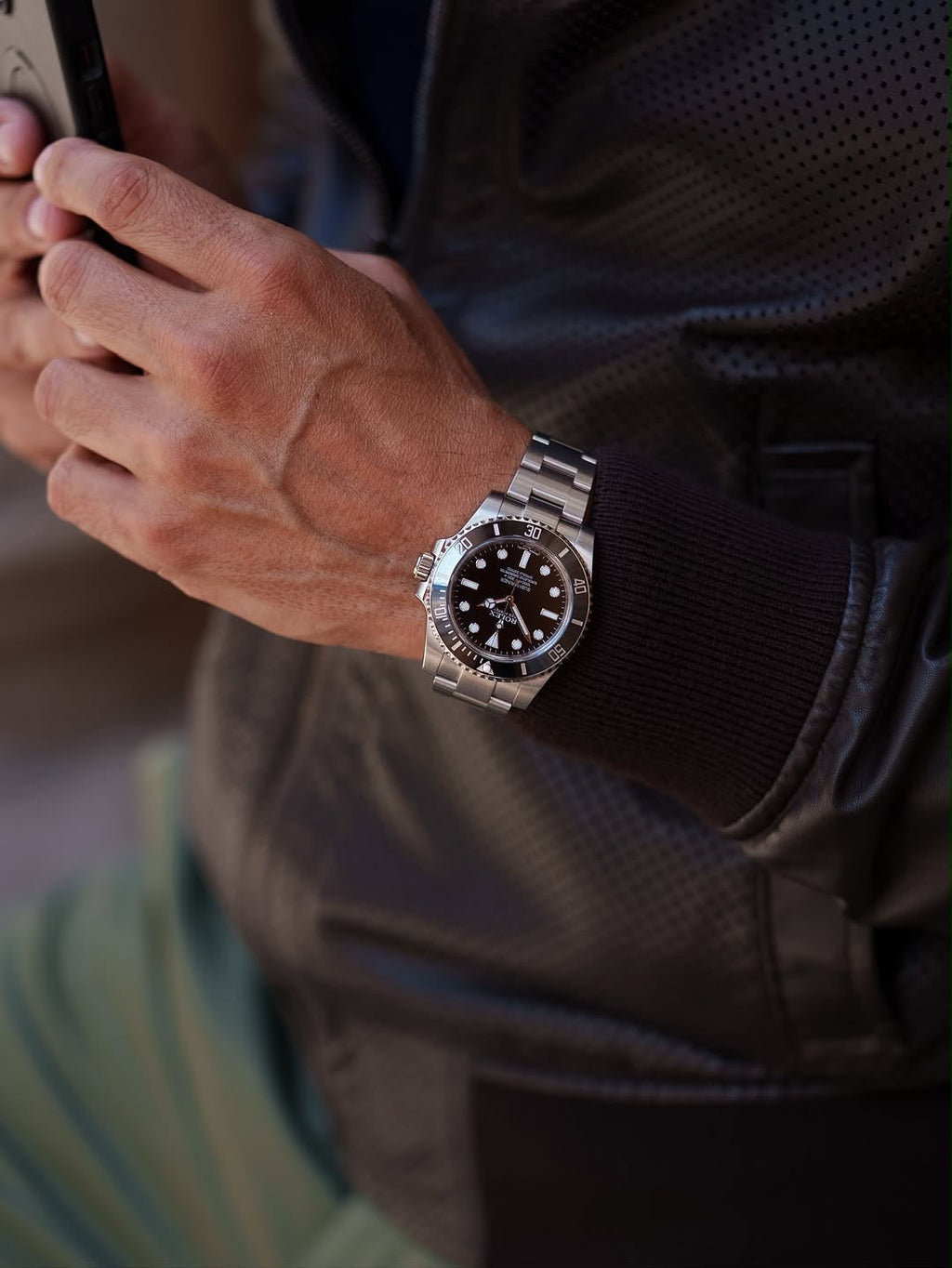 ROLEX SUBMARINE A BLACK DIAL AND BRUSHED STAINLESS STEEL OYSTER BRACELET AUTOMATIC WATCH