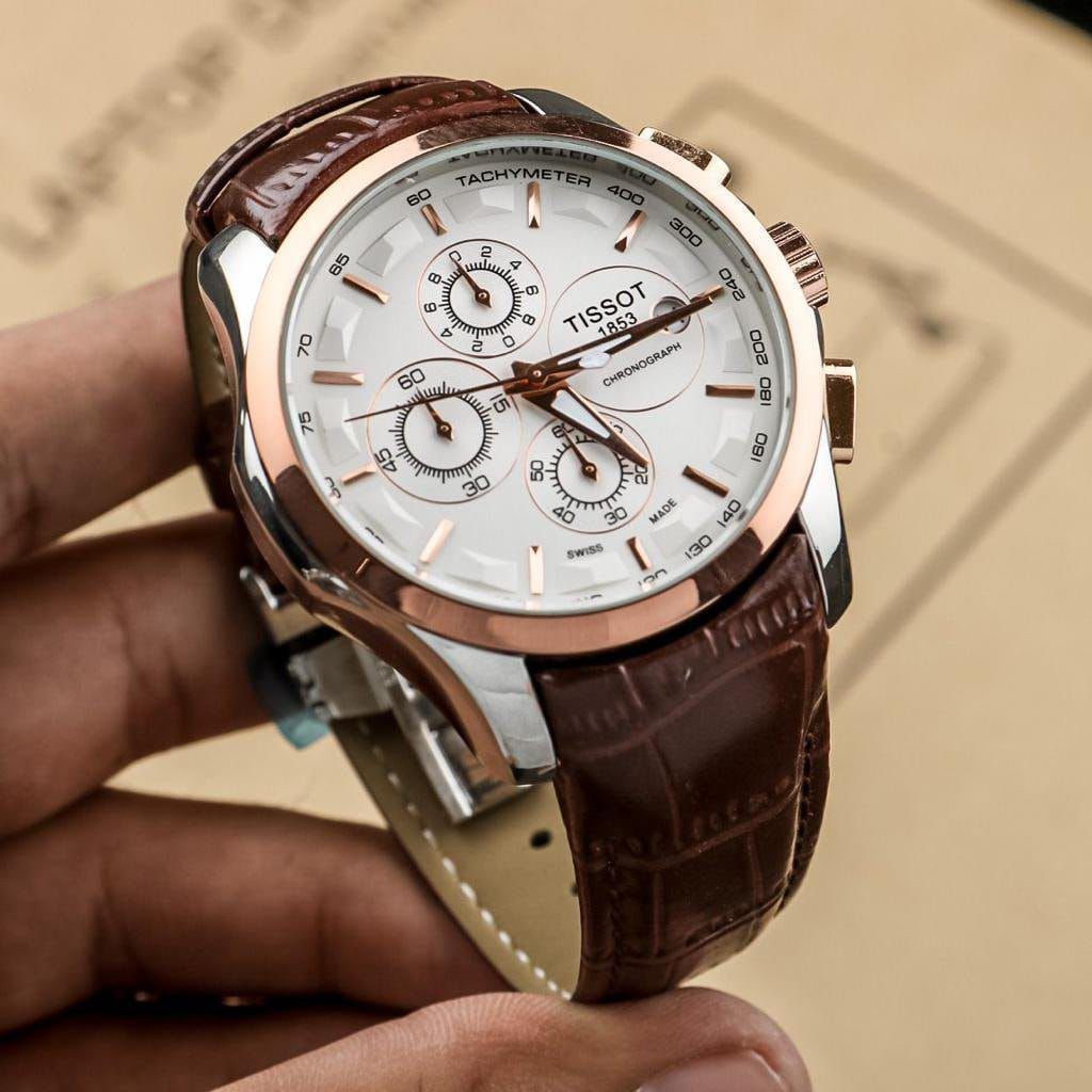 TISSOT TCLASSIC CHRONOGRAPH WATCH A WHITE DIAL ROSE GOLDTONE AND A BROWN LEATHER STRAP